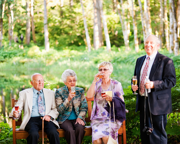 Elderly guests drink champagne  - Bridal Veil Lakes wedding - Portland Oregon