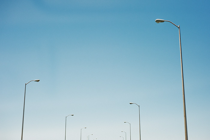 Portland Lifestyle Photographer - Telephone poles driving into the Bay Area