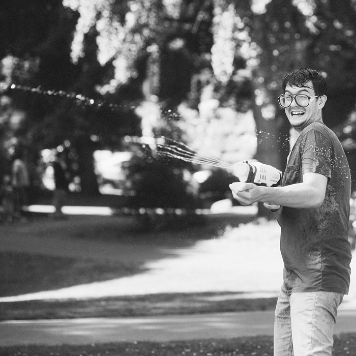 Portland Lifestyle Photographer - Water Gun Fight in Laurelhurst Park