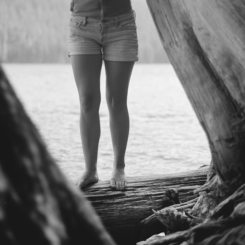 Rolleiflex - Molly standing on a log at Lost Lake