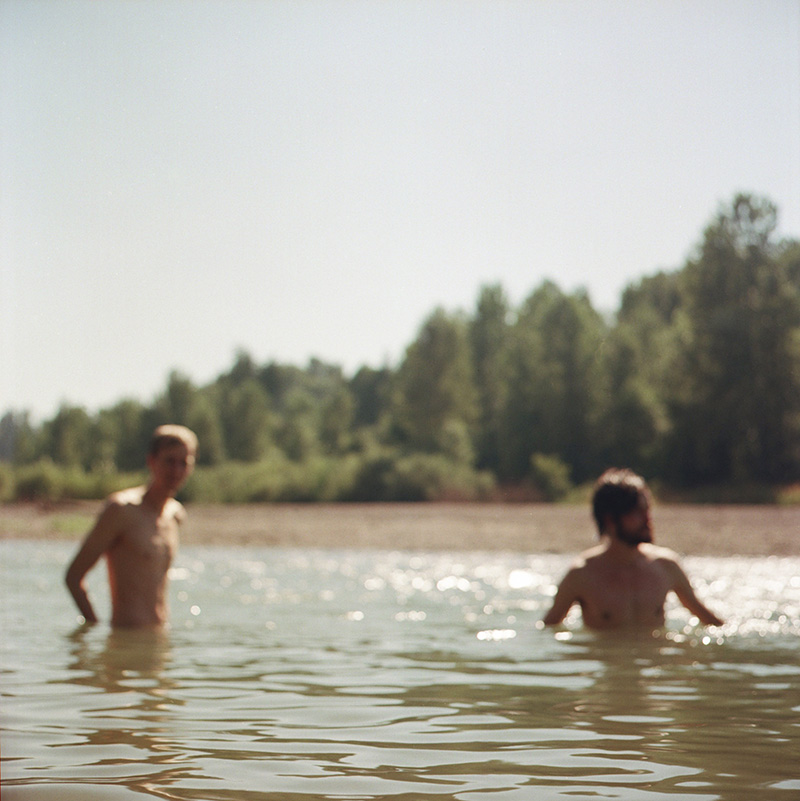 Portland Film Photographer - Out-of-focus shot of Chris and Mark in the Sandy River