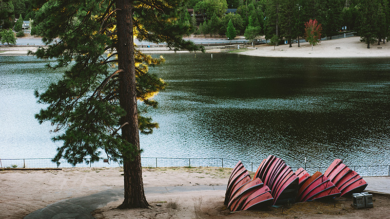 Rowboats on Lake Gregory | Kate & Will's Camp Seely Wedding | Kim Smith-Miller
