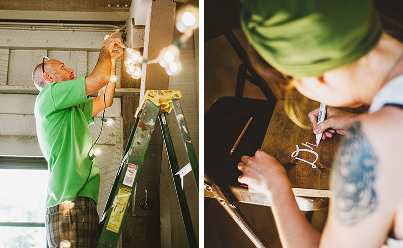 Guests stringing lights and handpainting signs | Kate & Will's Camp Seely Wedding | Kim Smith-Miller