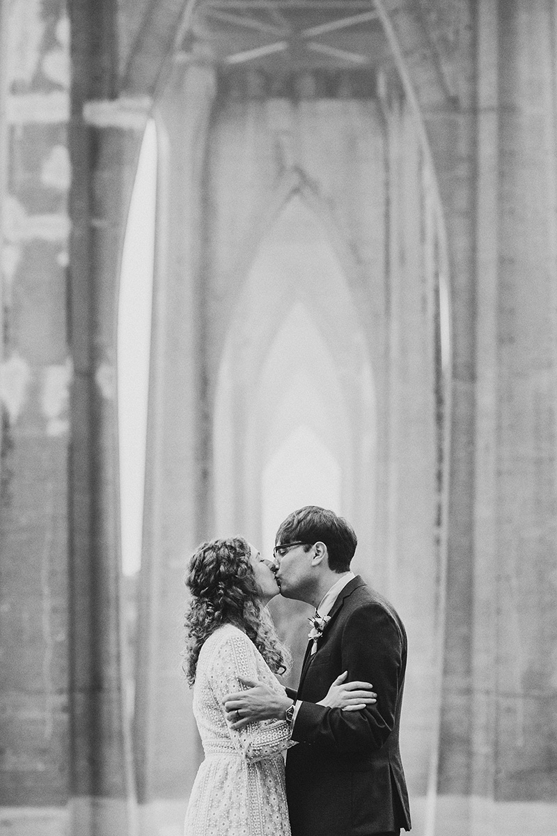 Bride and Groom kissing at their Cathedral Park Elopement in Portland, OR