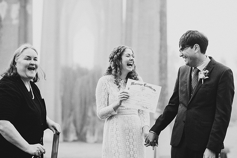 Bride and Groom presented Marriage Certificate at their Cathedral Park Elopement in Portland, OR