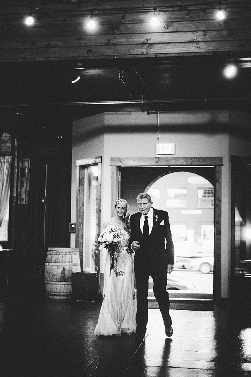 The bride walking down the aisle with her grandfather - Sodo Park Wedding Photographer