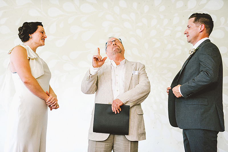 Danny Bruno officiating Katie and Marshall's Secret Society Wedding