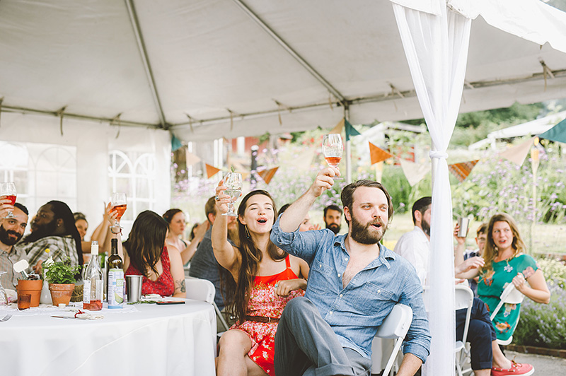 Guests cheering during toasts - Pendarvis Farm Wedding