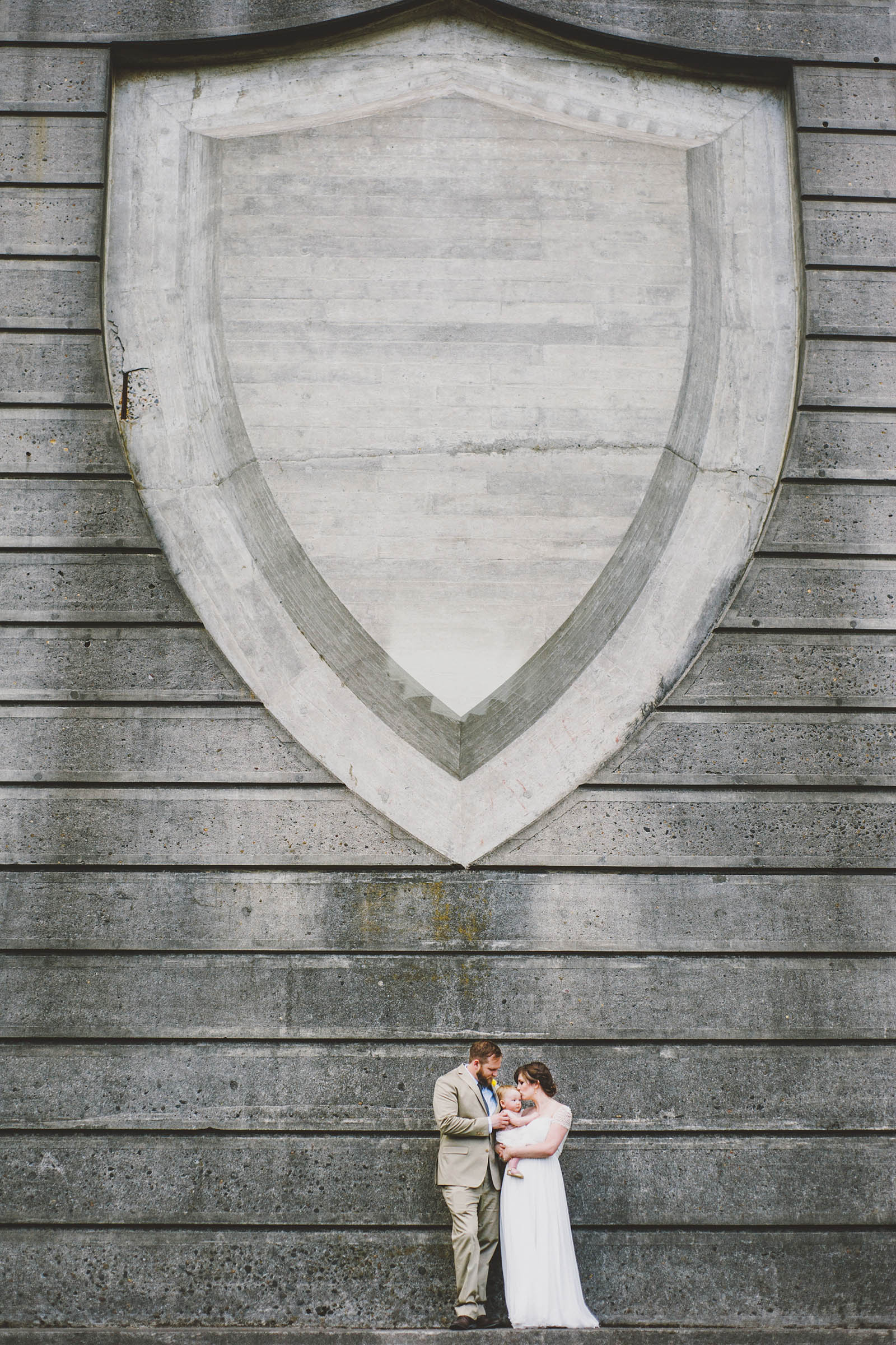 Bride, Groom and their baby | Cathedral Park Wedding