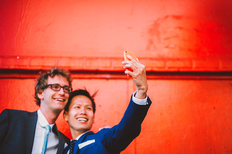 Foreign Cinema Wedding - Grooms taking a selfie before the ceremony
