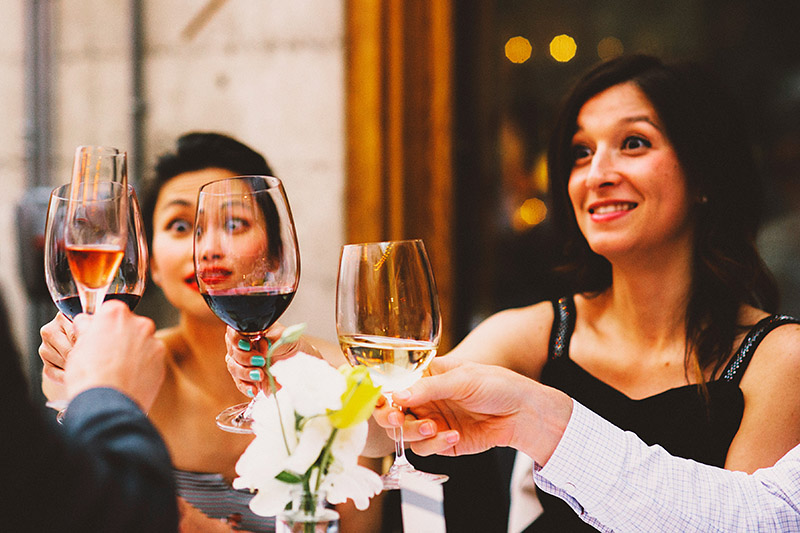 Guests toasting with wine at a Foreign Cinema Wedding