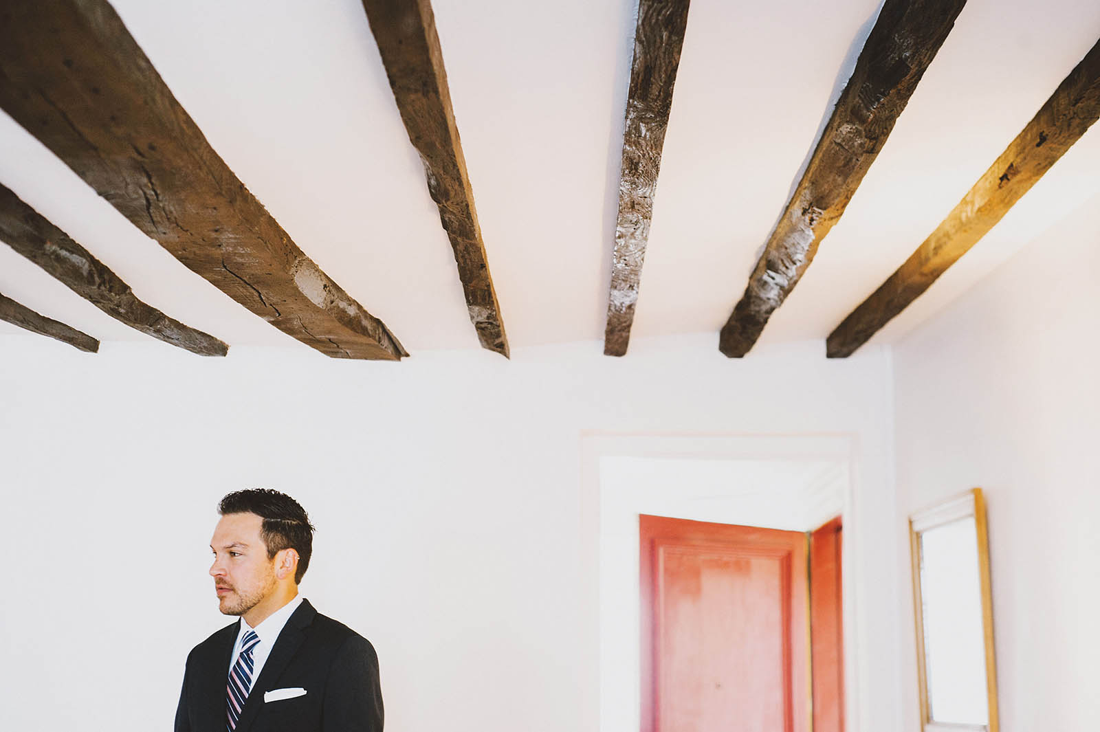 Groom waiting for the First Look | Springtime Paris Elopement at Parc des Buttes Chaumont