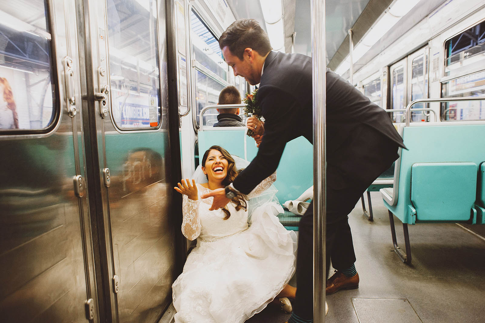 Bride falling down on the Metro | Springtime Paris Elopement at Parc des Buttes Chaumont