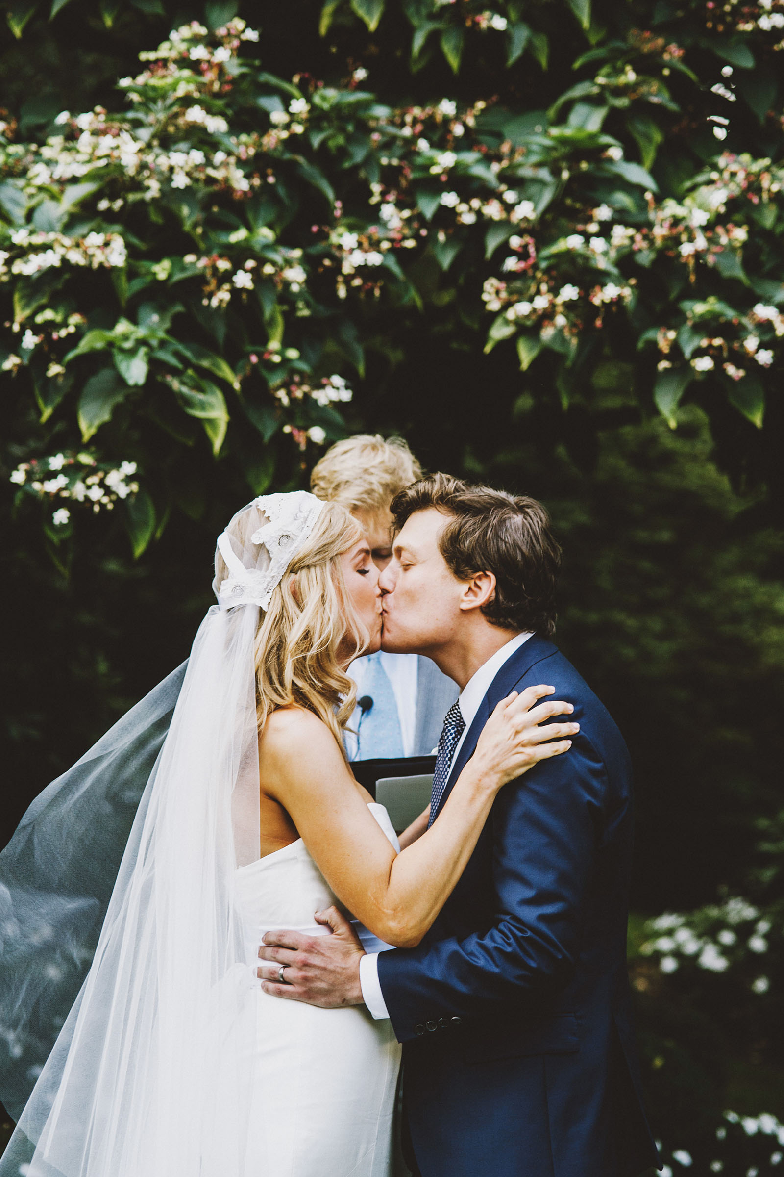 Bride and Groom kissing at the ceremony on the lawn | Portland Town Club Wedding