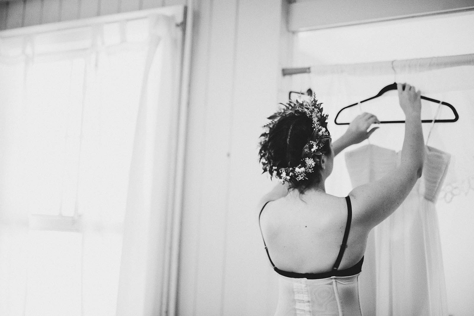 Bride getting dressed | SouWester Lodge Wedding