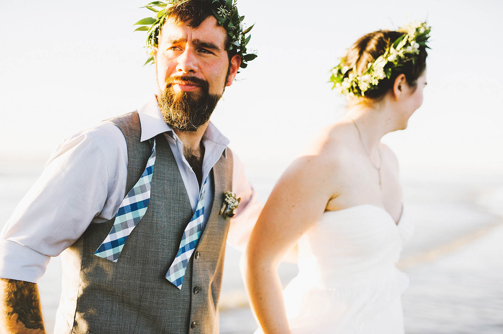 Bride and groom walking on the beach | SouWester Lodge Wedding