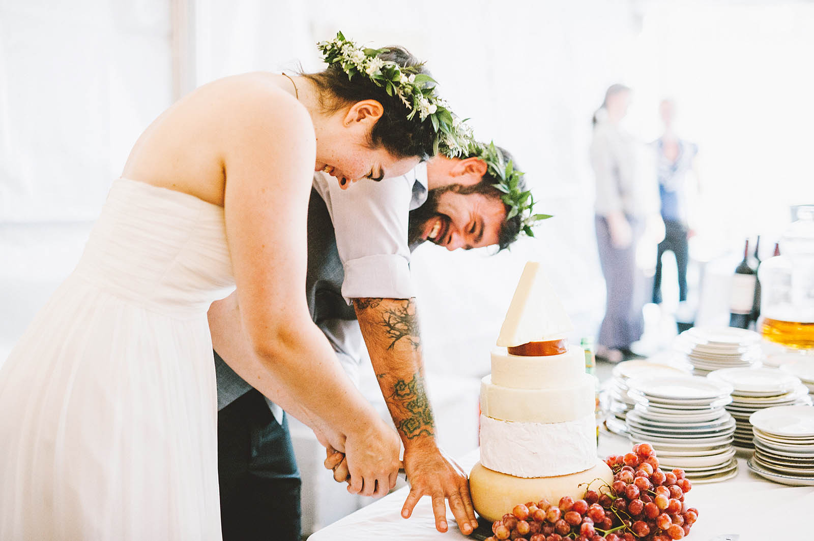 Cutting the cheese cake tower | SouWester Lodge Wedding