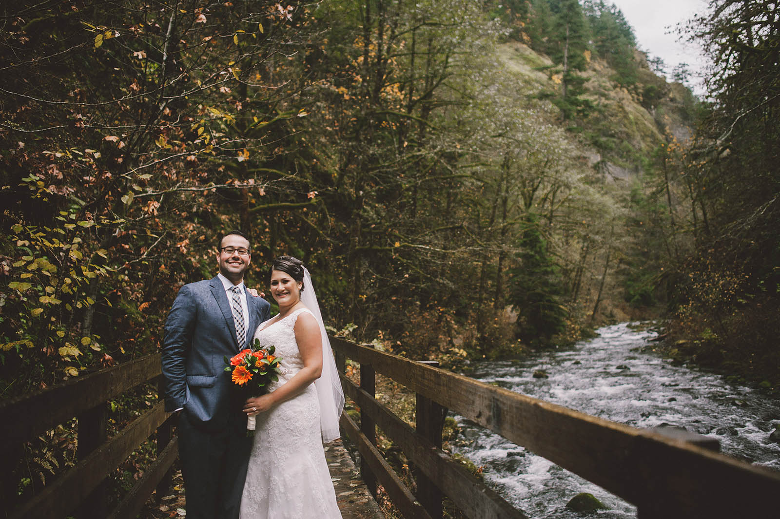 bride and groom on the trail bridge | Wahclella Falls Elopement