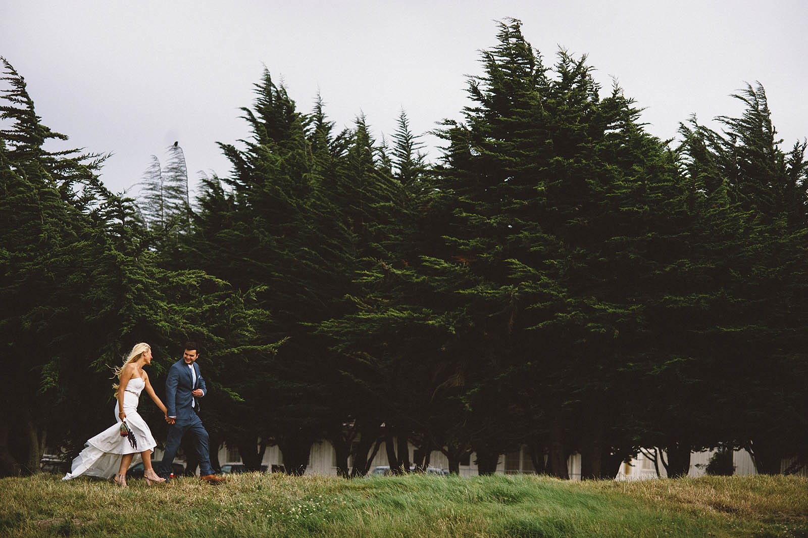 Couple walking out to see the Golden Gate Bridge | San Francisco City Hall Wedding
