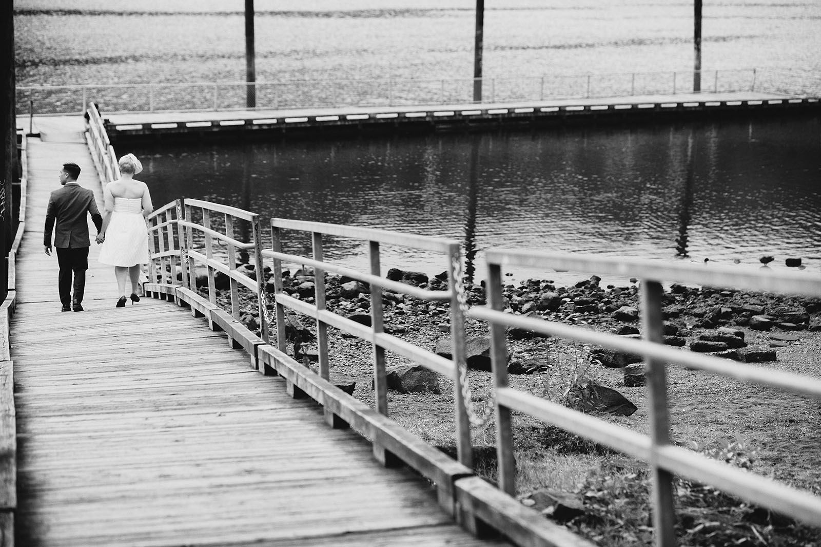 Bride and Groom walking down the docks in Cathedral Park | Portland Oregon Elopement