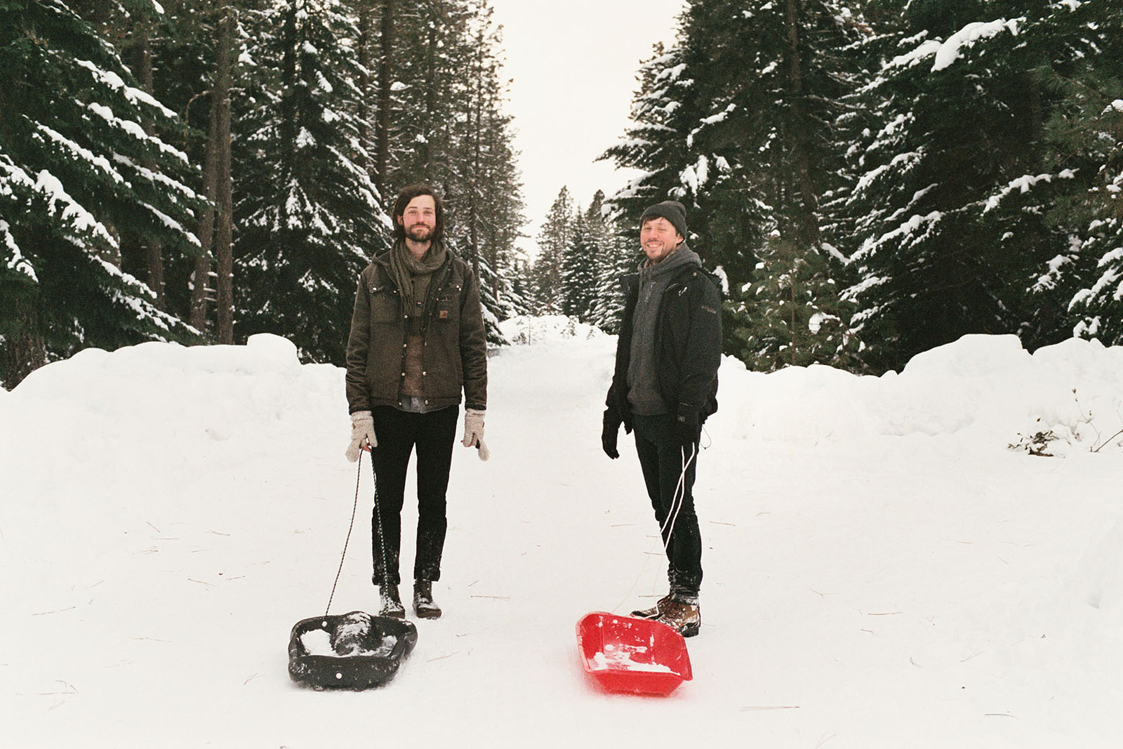 Mark and Amos walking to a snow sledding hill in Trout Lake, WA | Contax Aria