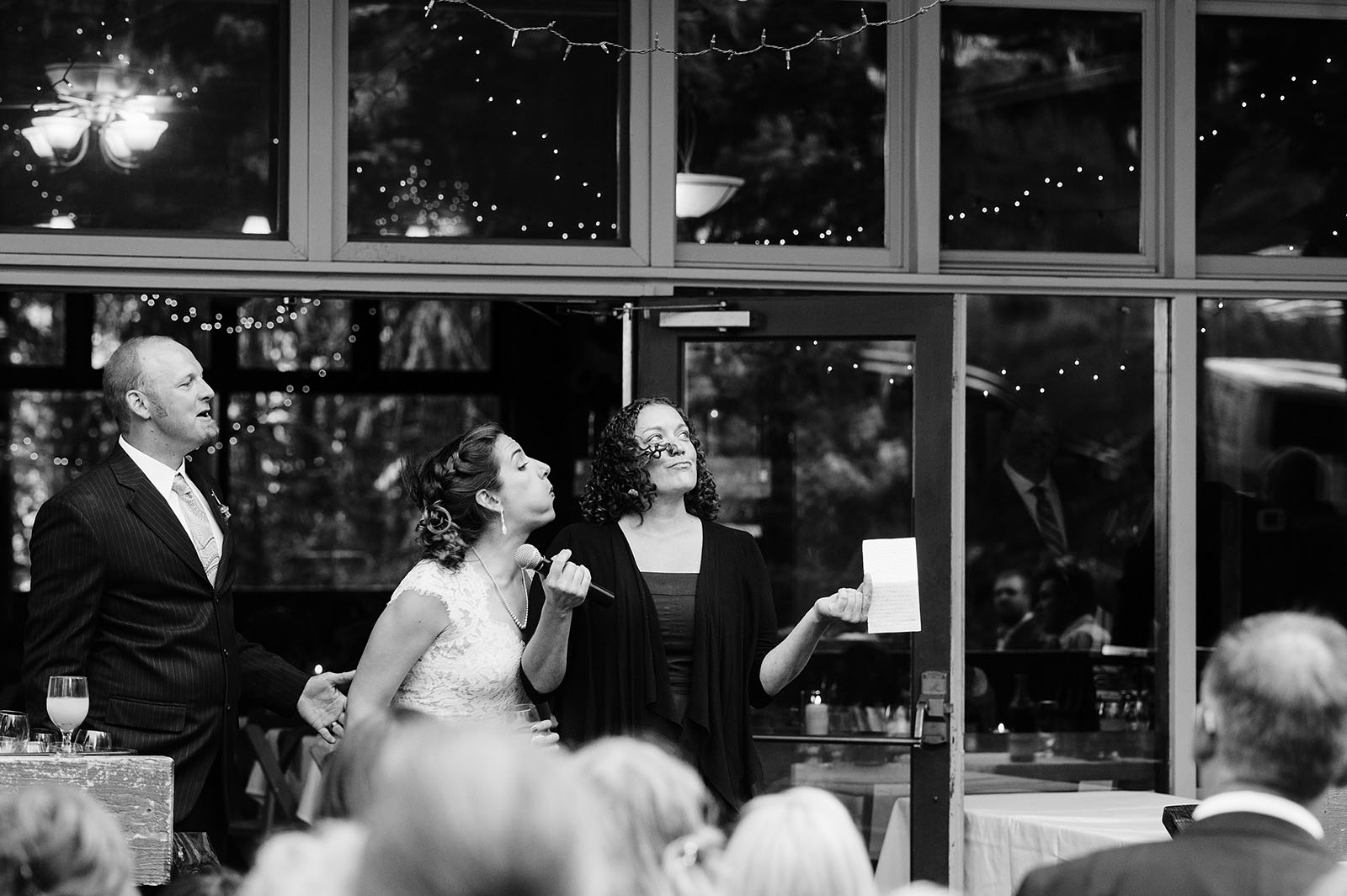 Bride blowing into Maid of Honor's teary eyes | Mazama Lodge Wedding