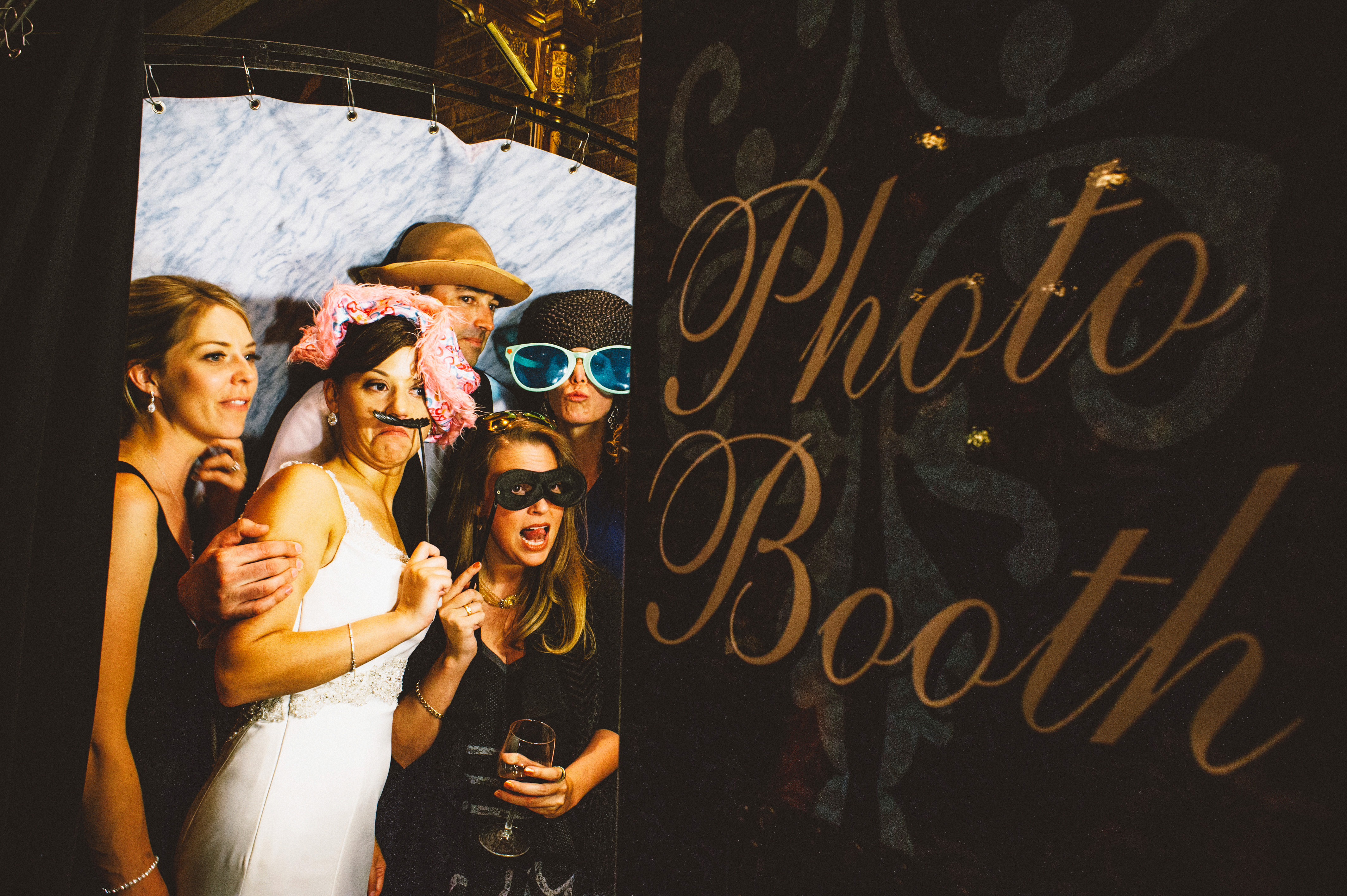 Wedding party crammed into the photobooth | Sacramento Firehouse Wedding