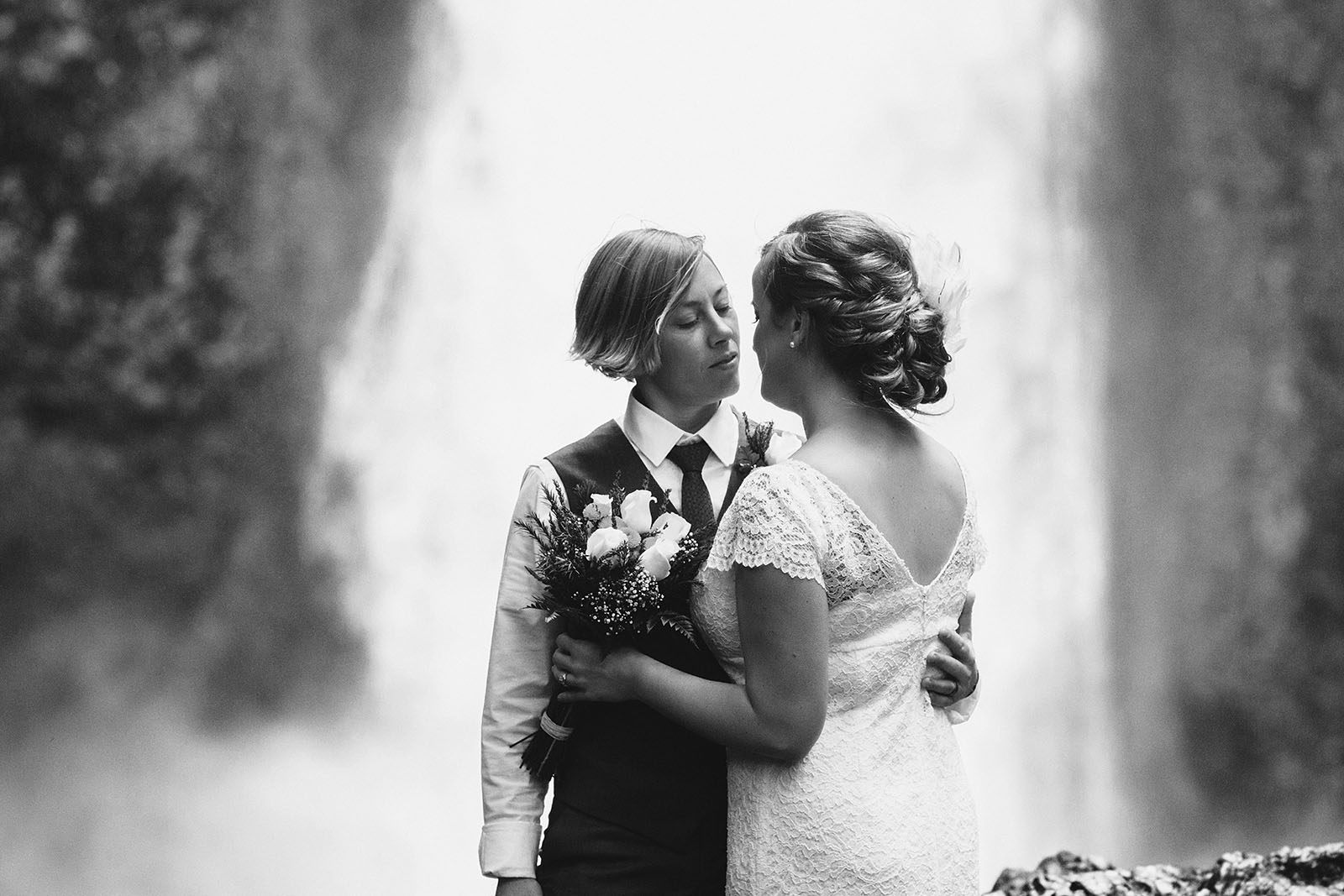 Brides embracing before ceremony | Wahclella Falls Wedding