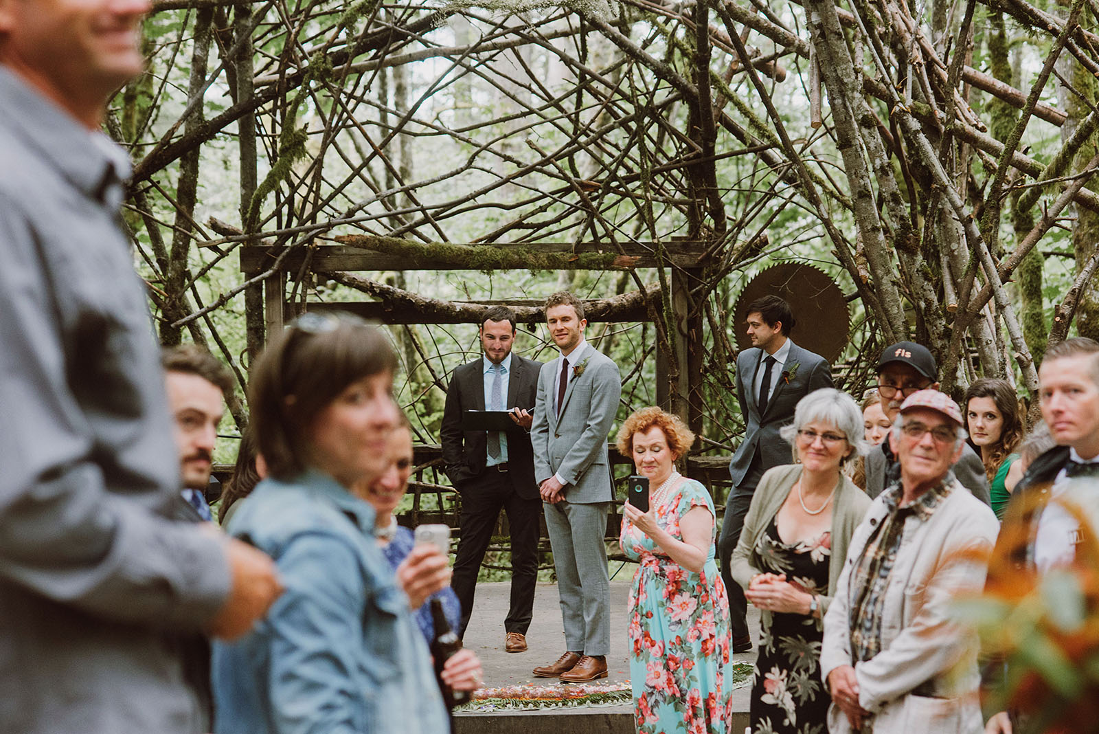 Groom seeing Bride walk down the aisle | Woodsy Campground Wedding