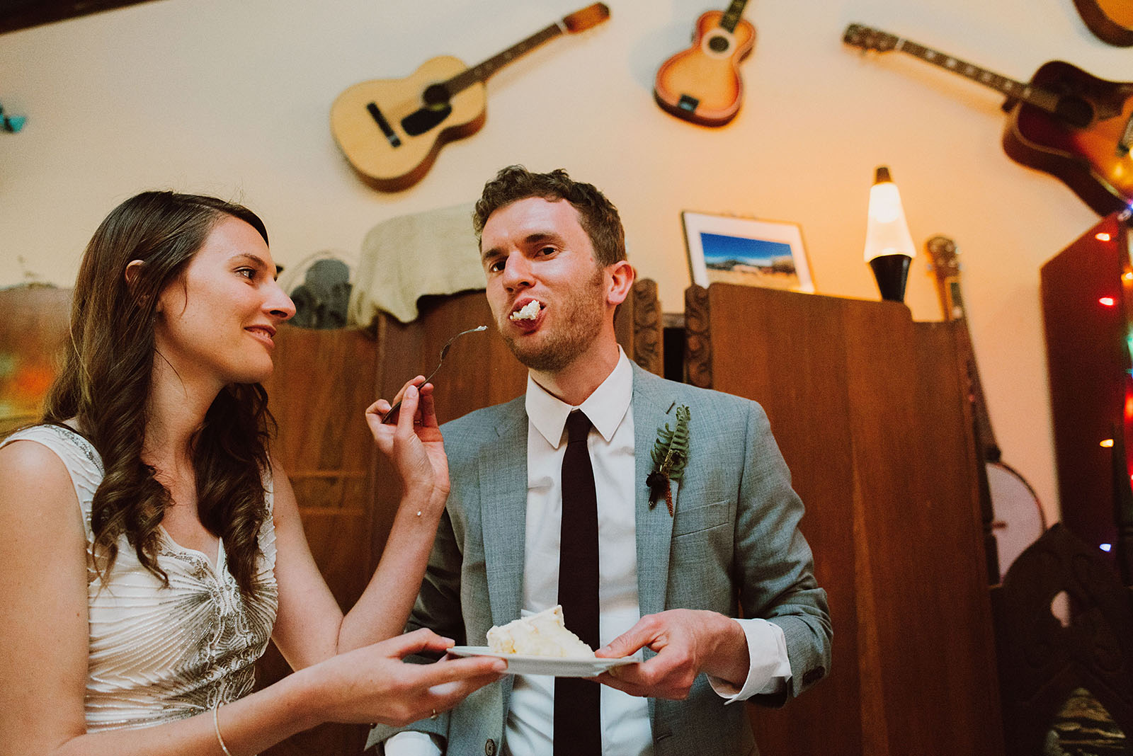 Cake cutting inside the Galaxy Barn | Woodsy Campground Wedding