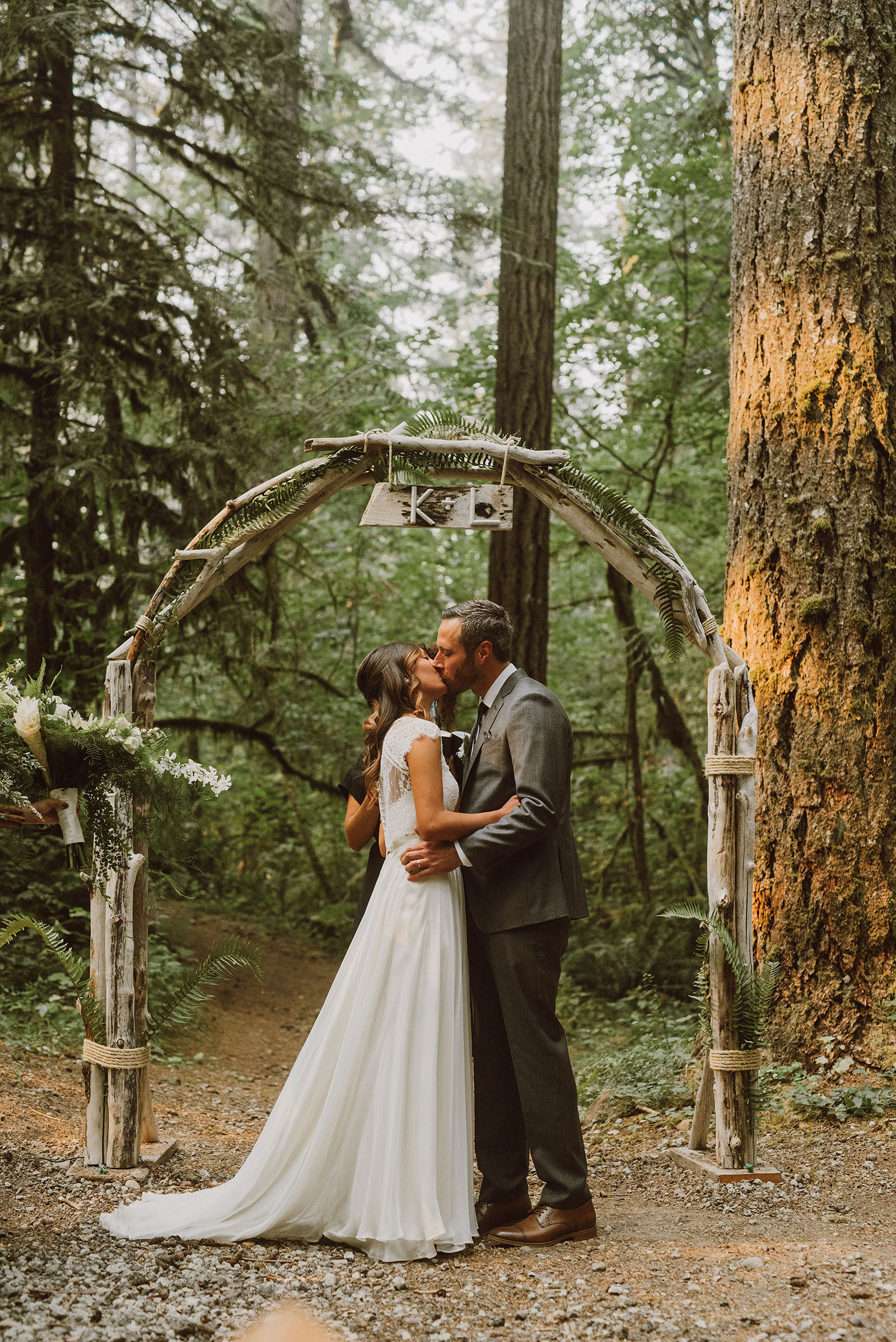 Bride and Groom's first kiss at their Camp Namanu wedding ceremony