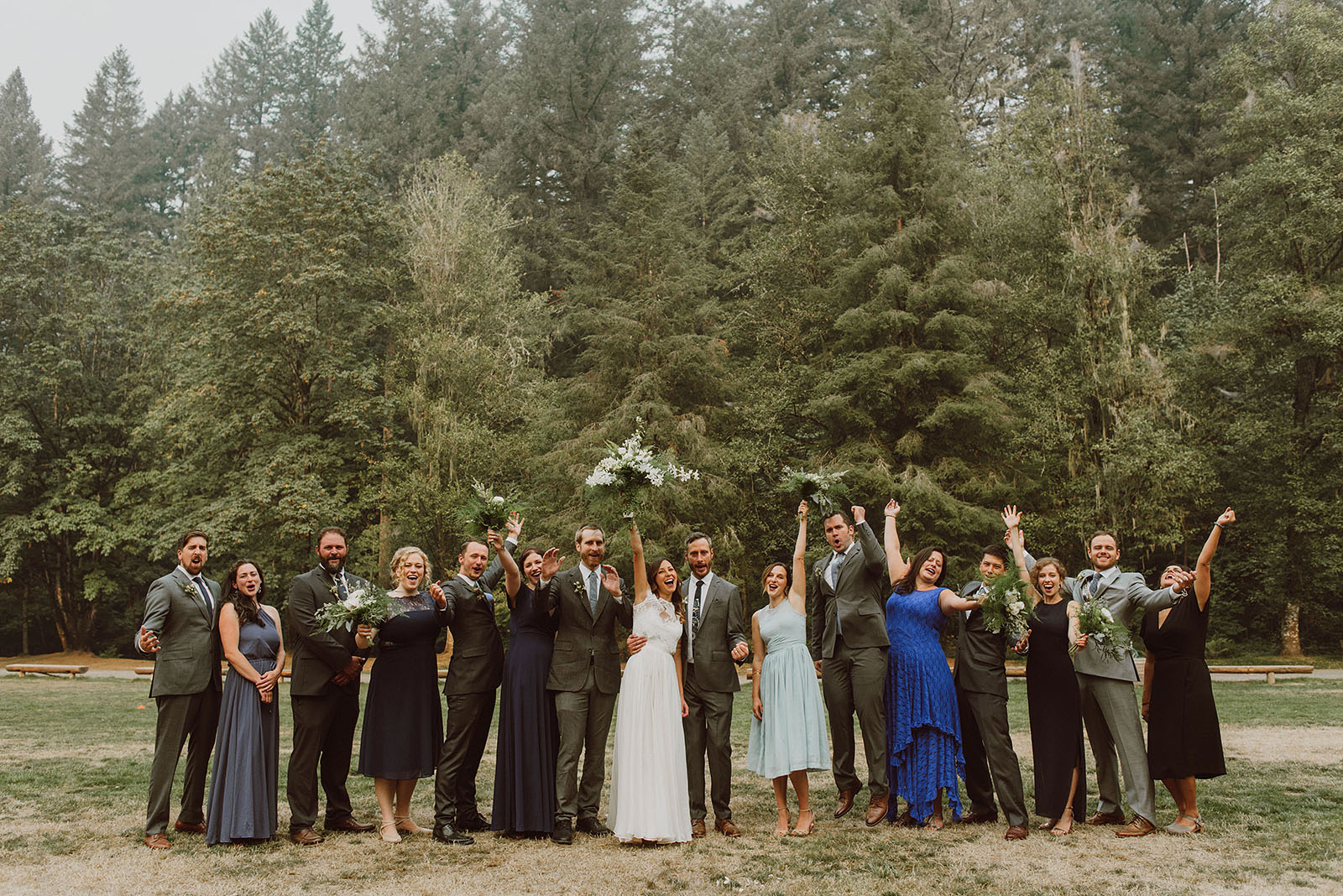 Friends and family cheering at a Camp Namanu wedding