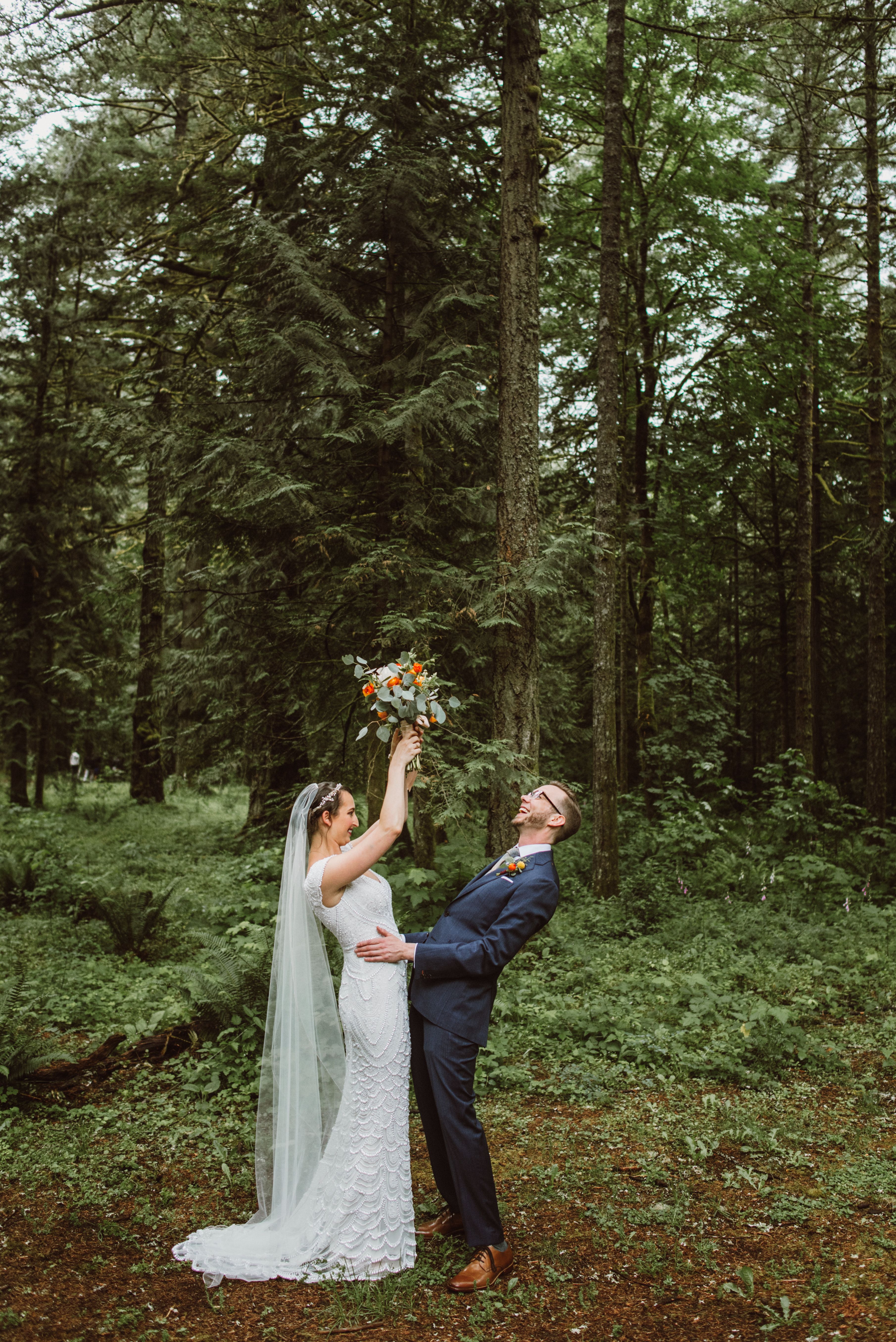 Bride and Groom rejoicing after First Look at Camp Angelos