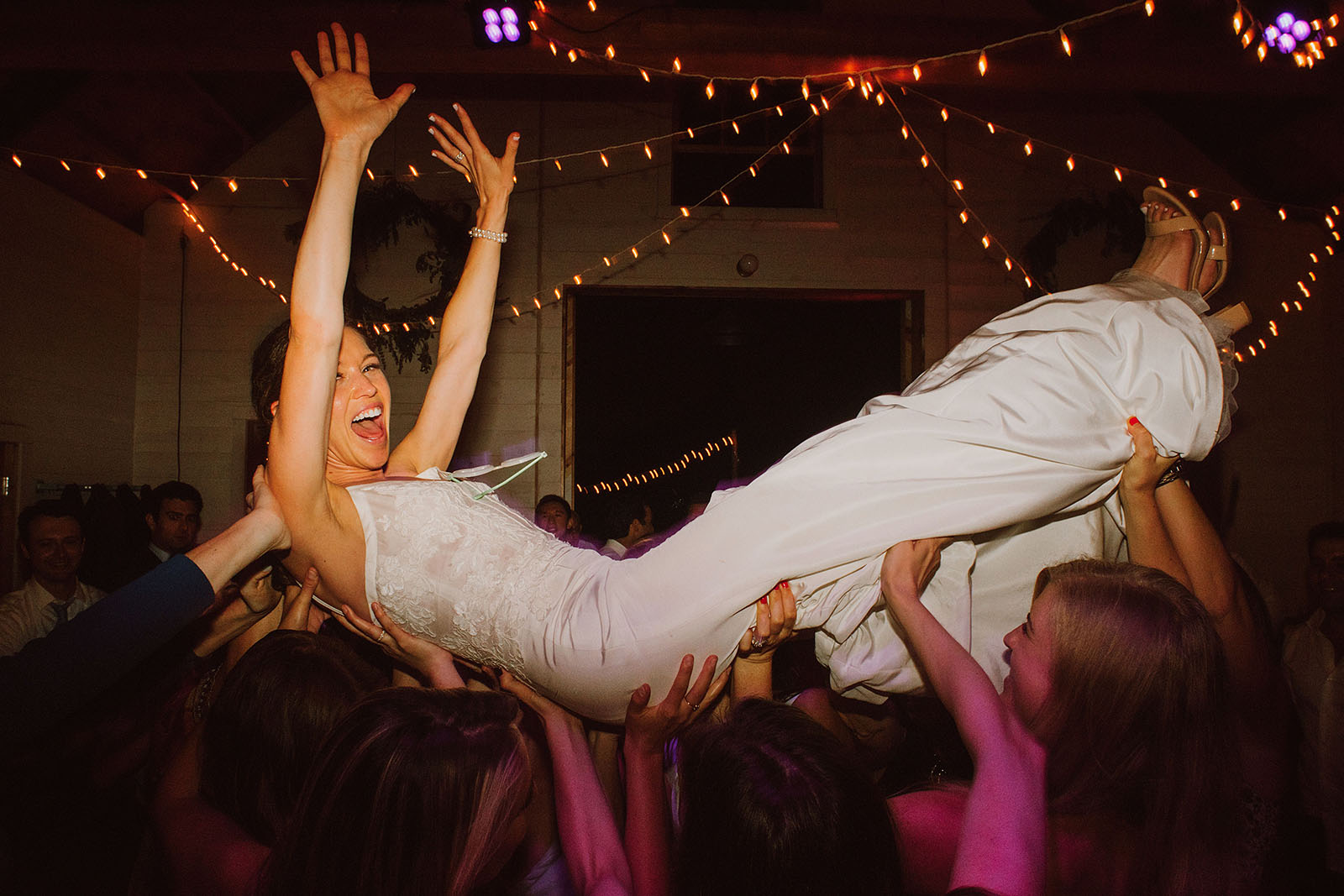 crowdsurfing bride at the Croft Farm on Sauvie Island - Portland Wedding photography