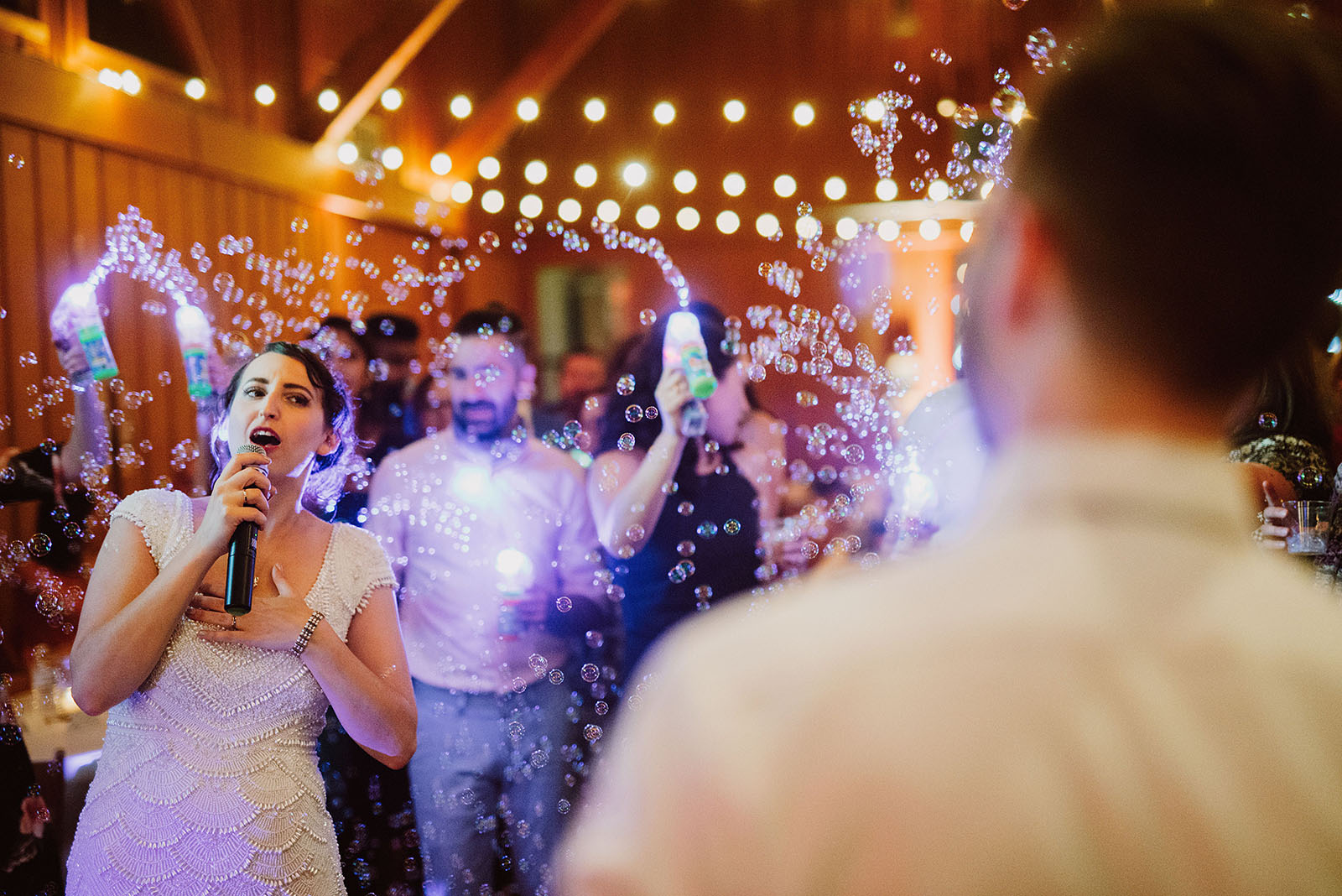 bride doing karaoke at Camp Angelos - Portland Wedding photography