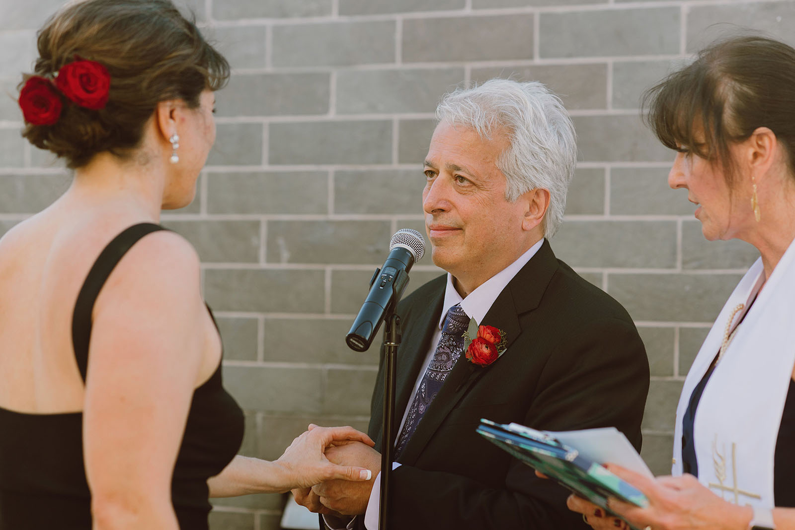Groom exchanging vows at his Ecotrust Wedding