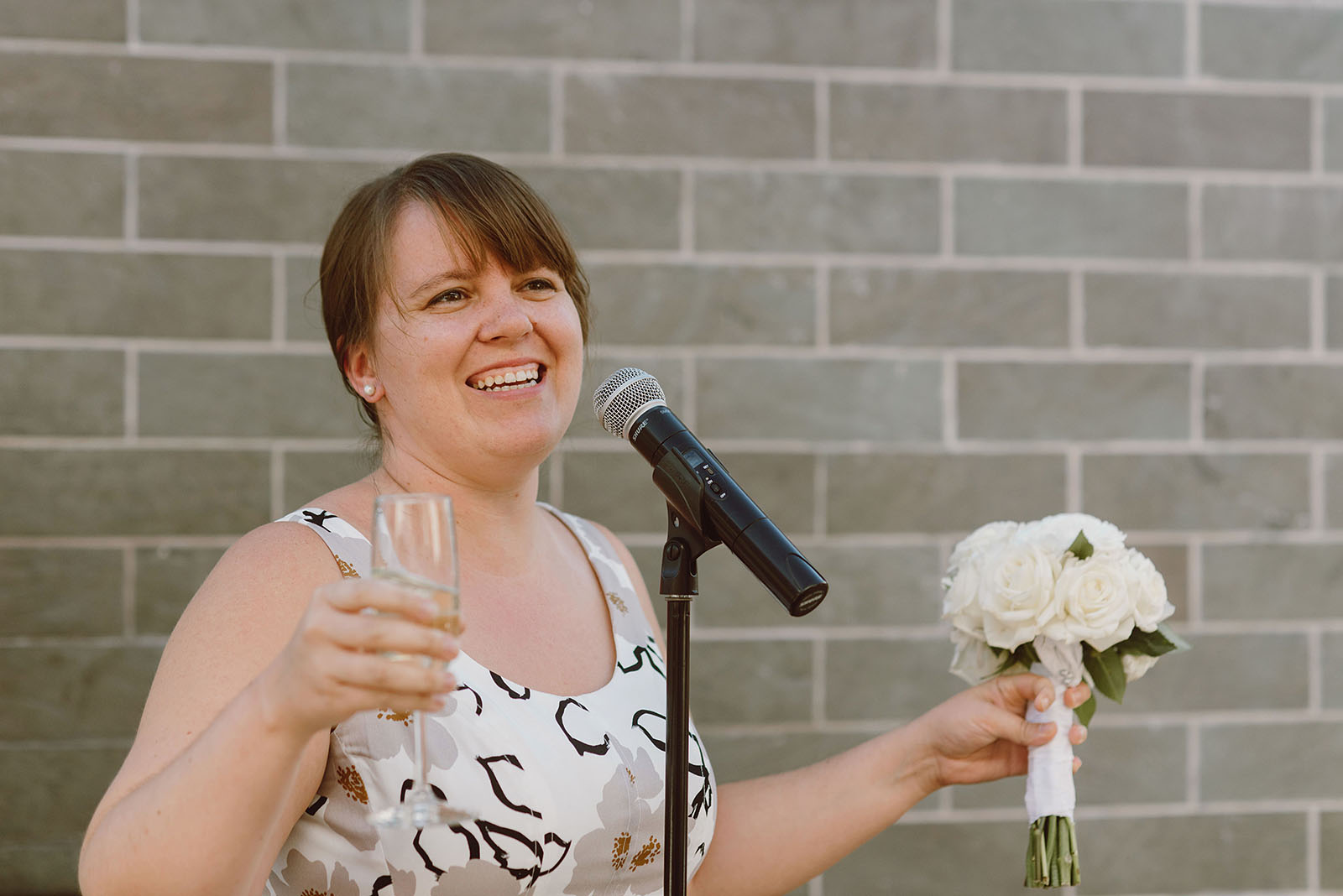 Bride's daughter giving a toast at their Ecotrust Wedding reception