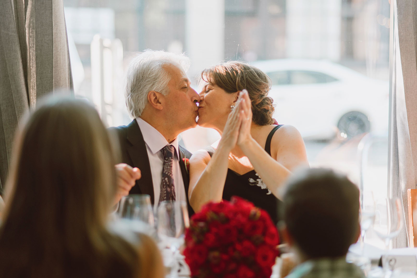 Bride and Groom kissing at Trattoria Gallo Nero