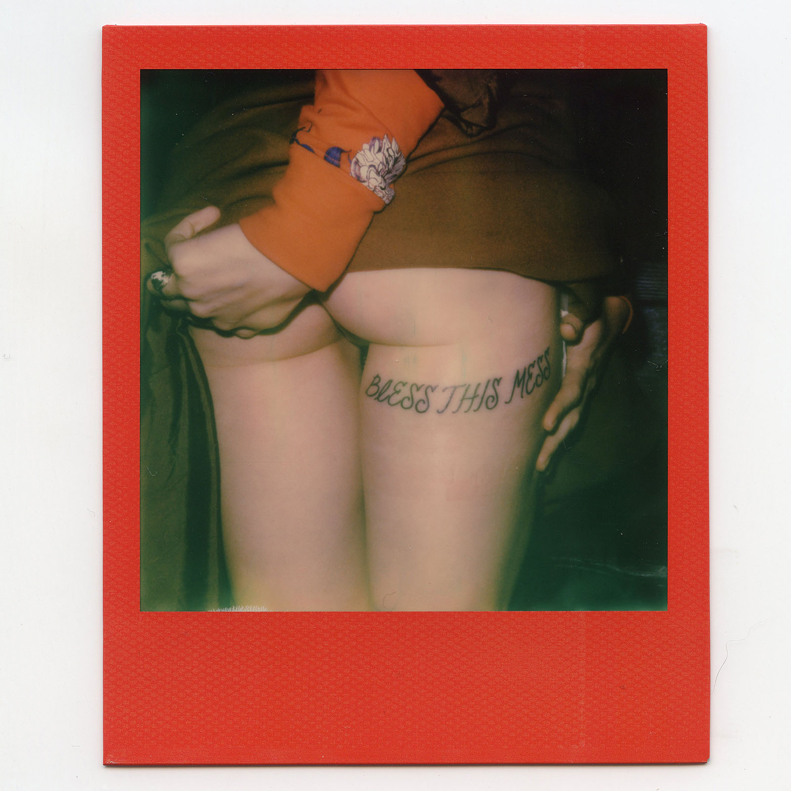 Polaroid of Joy Pearson's butt tattoo