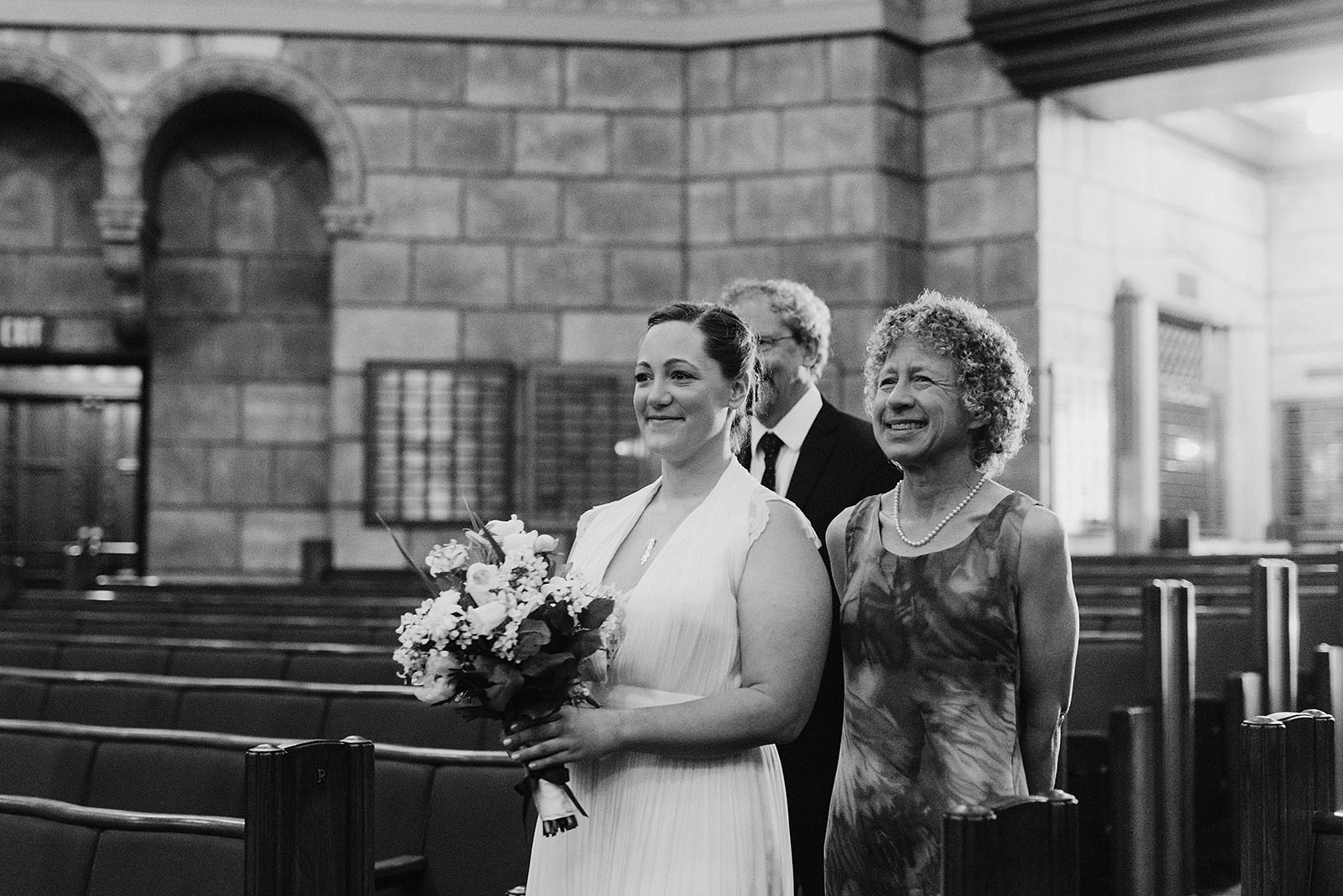 Bride walking down the aisle of a Congregation Beth Israel wedding