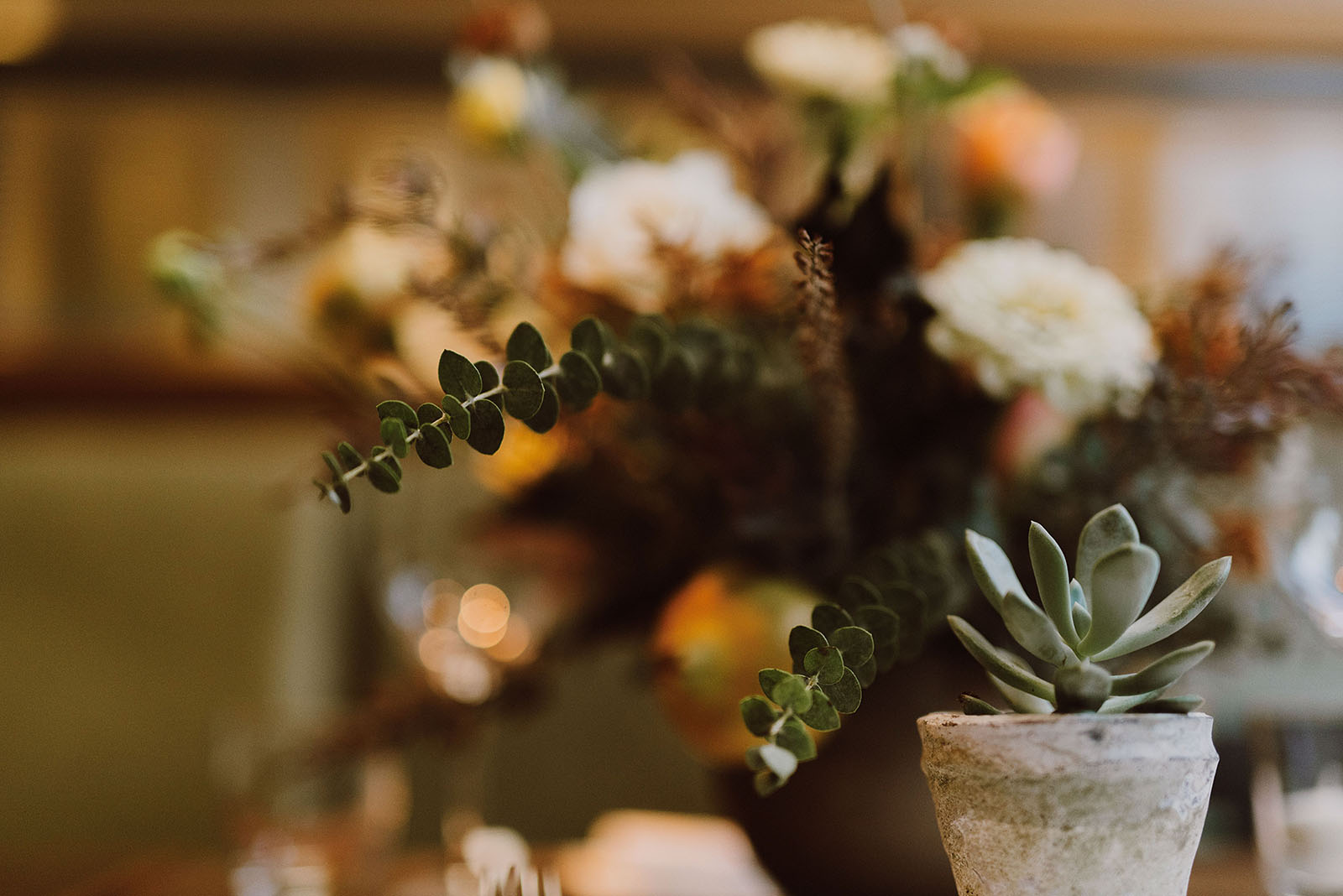 Succulents and flower table settings at a Foreign Cinema wedding