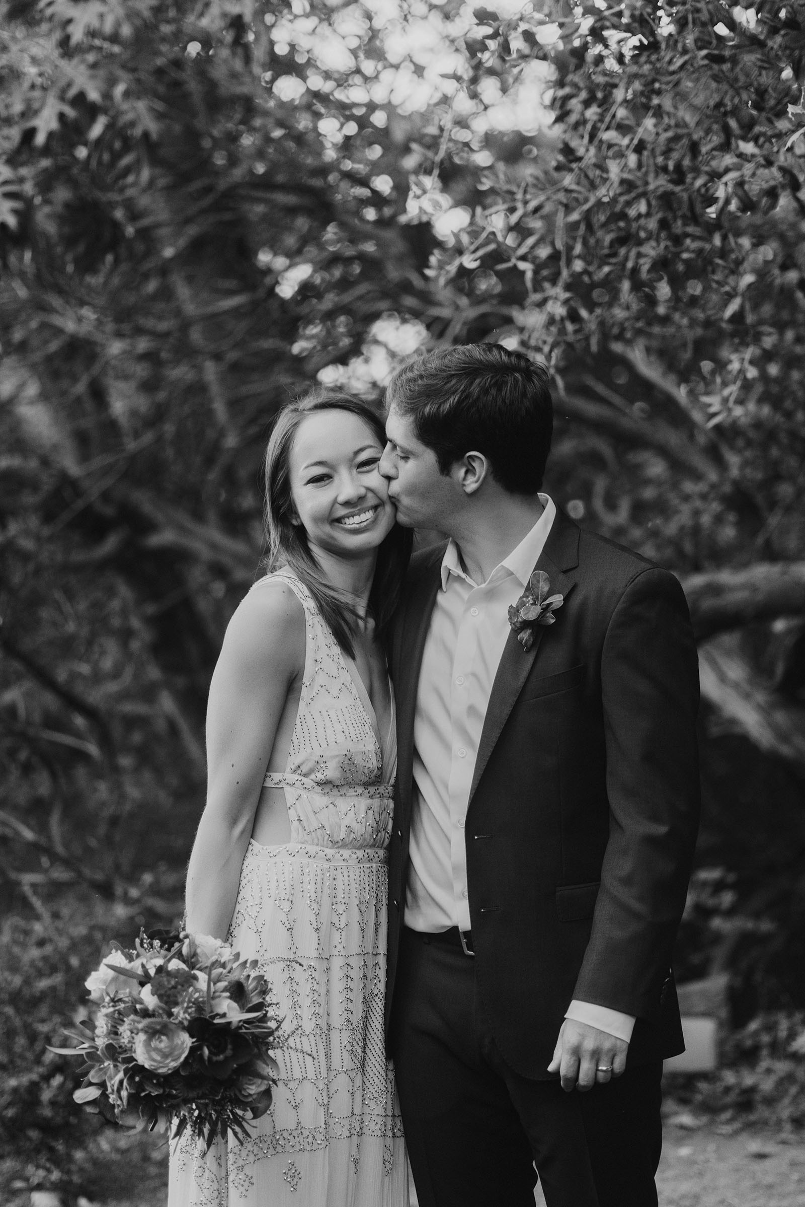 Bride and Groom kissing at Sacred Mountain Retreat Wedding