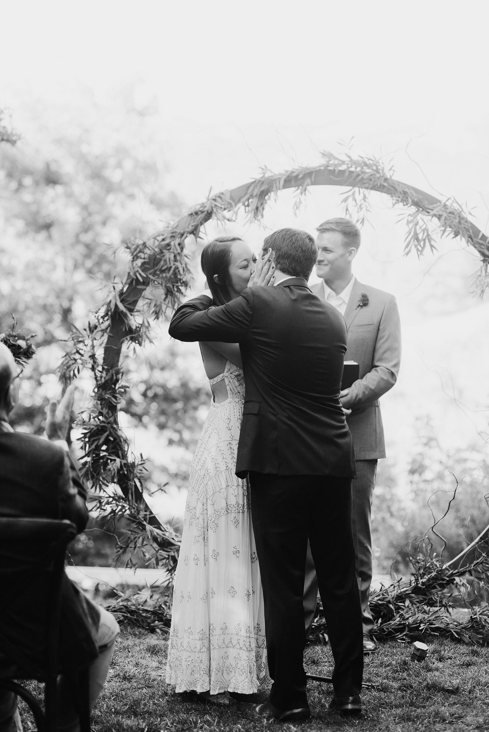 Bride and Groom kissing at a Sacred Mountain Retreat wedding ceremony