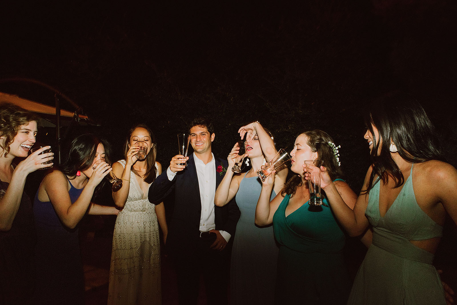 group photo of guests doing shots at a Sacred Mountain Retreat Wedding