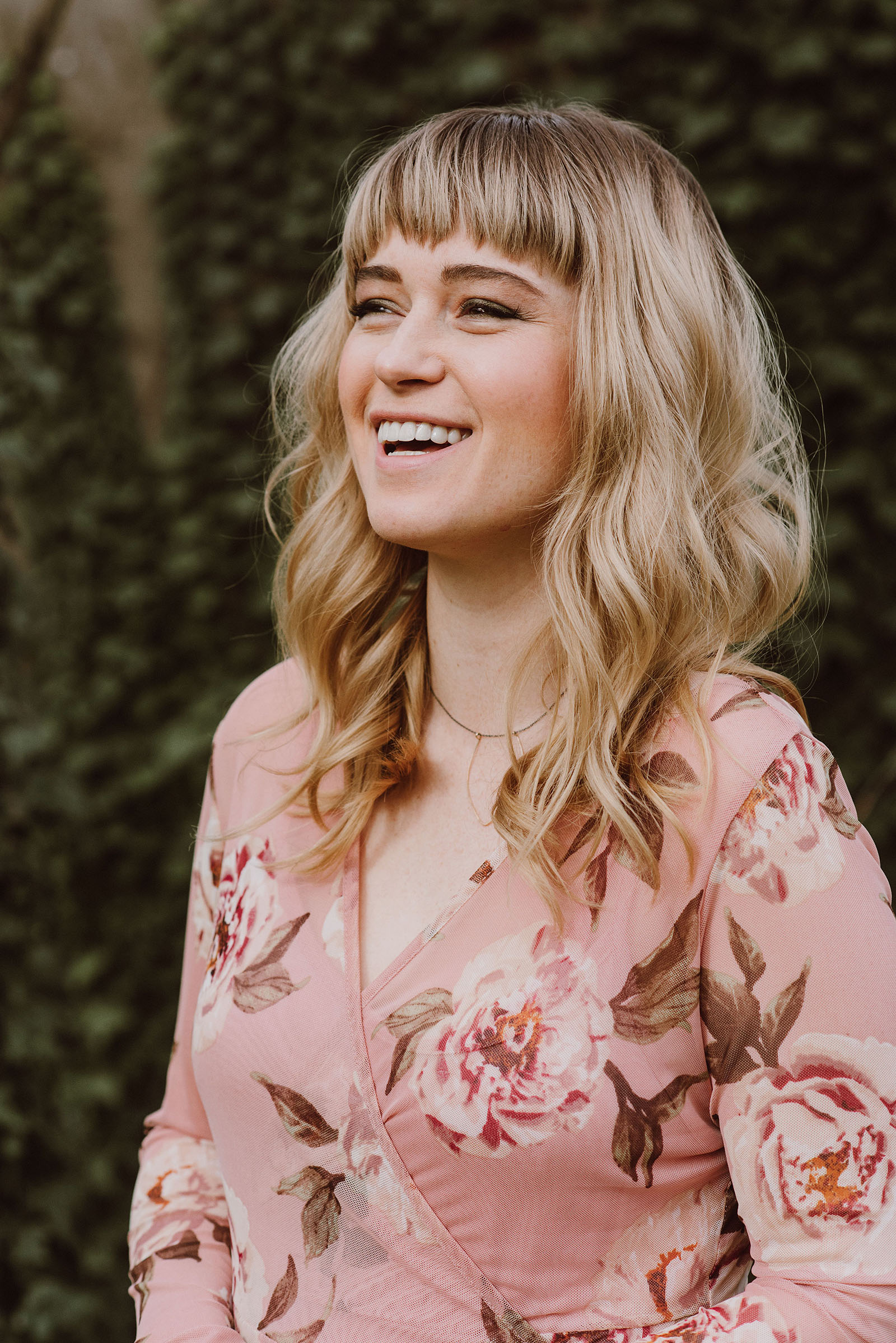 Portland Bridal Photography - Bridesmaid laughing while in full hair and make-up