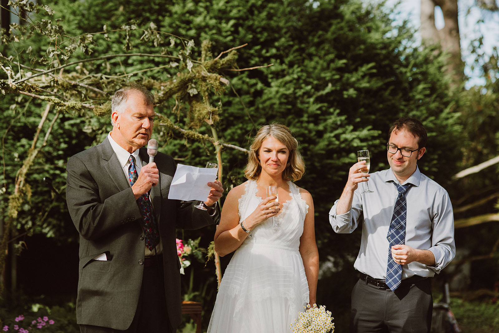 Father of the bride giving a toast at a SouWester Wedding in Seaview, WA