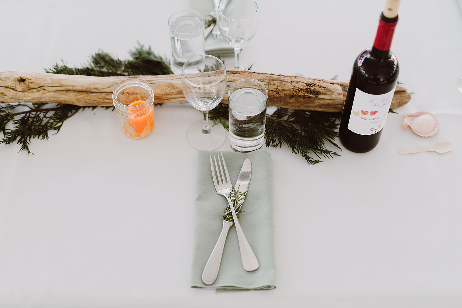 Driftwood table centerpieces at a SouWester Wedding in Seaview, WA