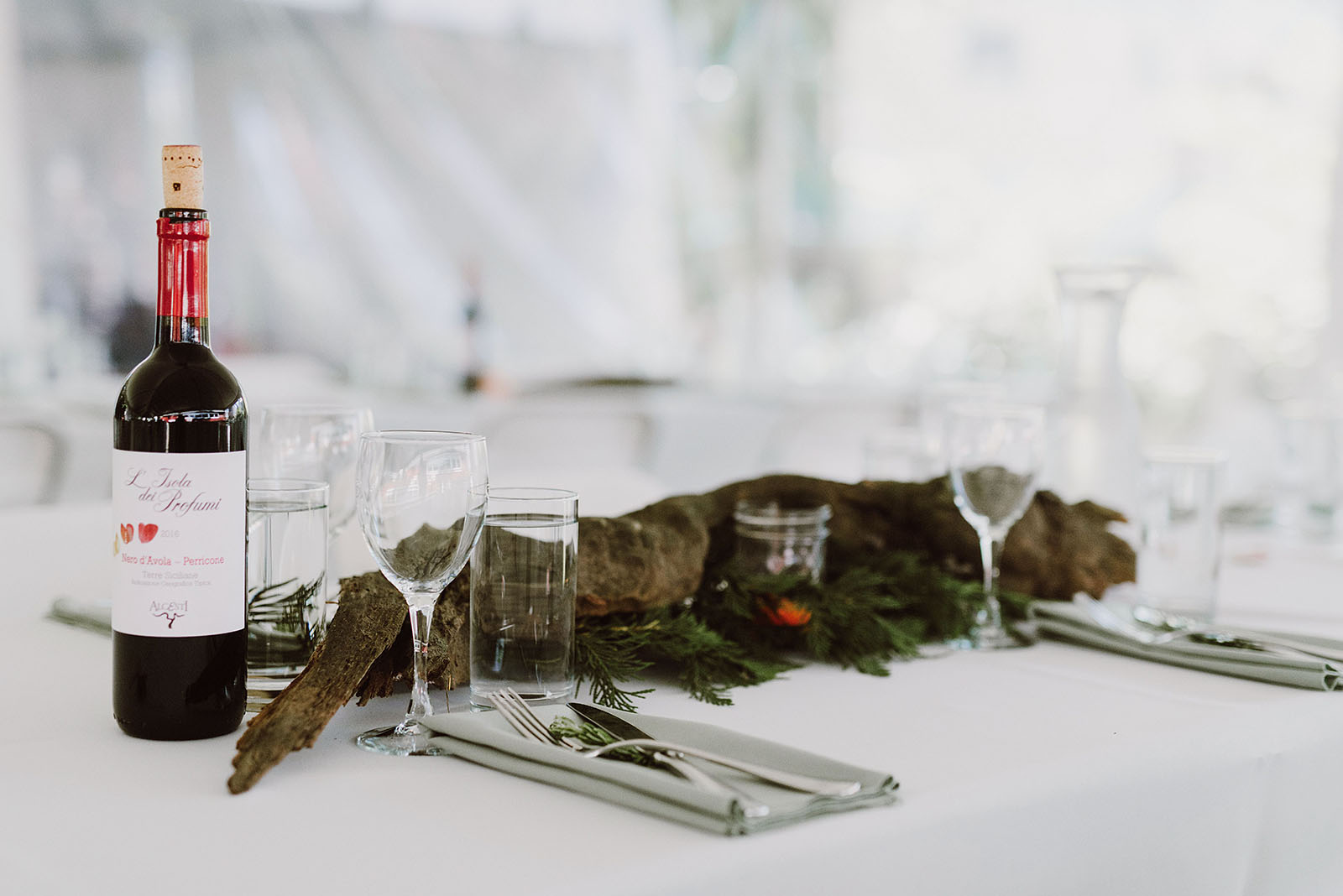 Driftwood table centerpieces at a SouWester Wedding in Seaview, WA