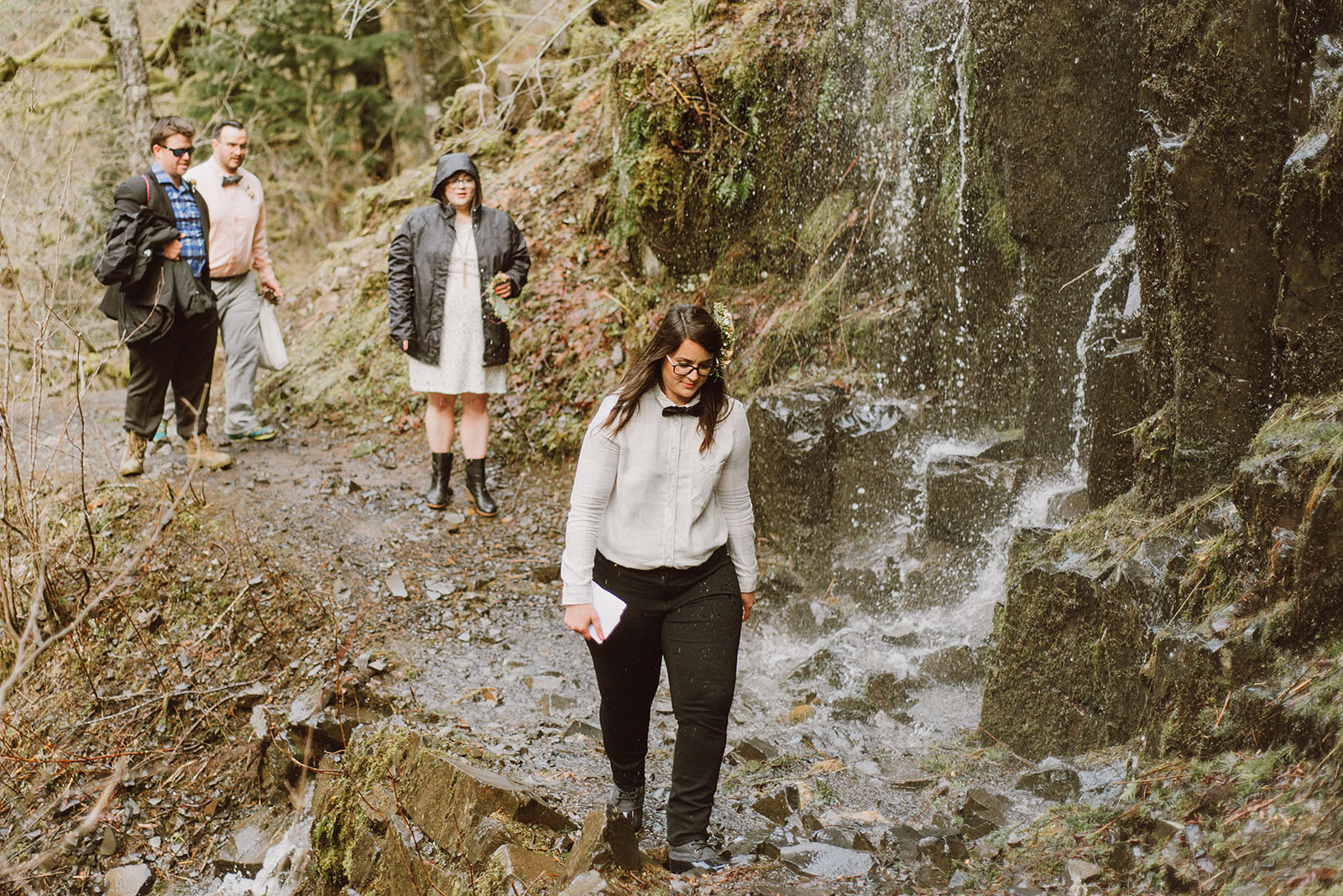 Guests hiking the Wahclella Falls trail at a Portland waterfall elopement