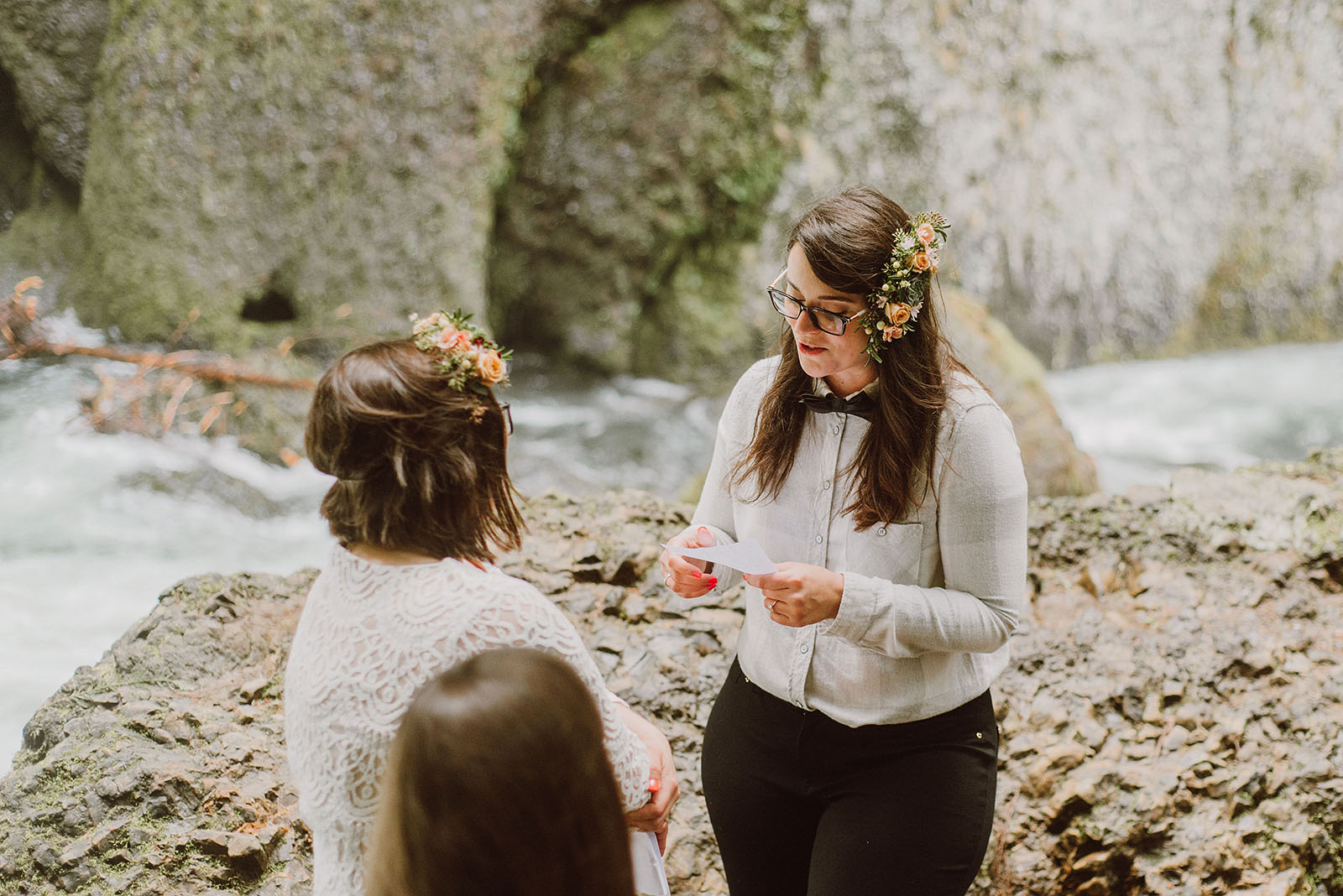 Brides exchanging vows at a Portland waterfall elopement